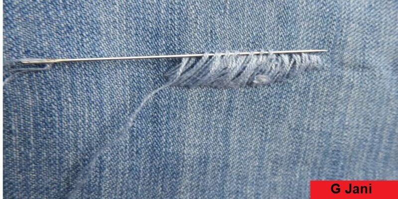 Make darning stitches to cover the hole